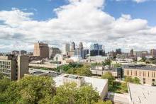 Aerial view of NJIT's campus with the buildings of Newark behind it